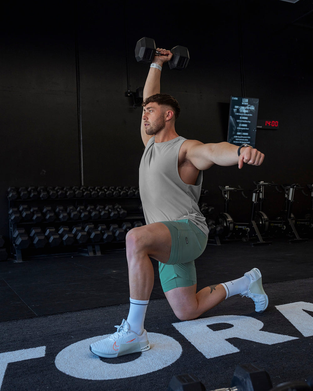 Man wearing Challenger 6" Lined Performance Shorts - Sagebrush