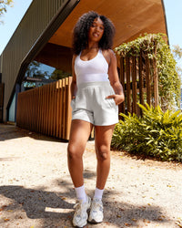 Woman wearing Elevate SoftTouch 4" Shorts - Clay-Clay