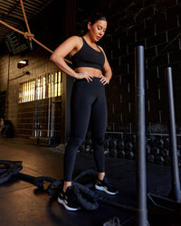 Woman wearing Elite High-Rise Full Length Legging Pockets - Black