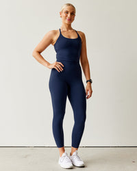 Woman wearing Elixir Ultra High-Rise 7/8 Legging - Future Navy