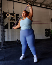 Woman wearing Lift Performance Tank - Glacial Blue | Thumbnail Index: 1