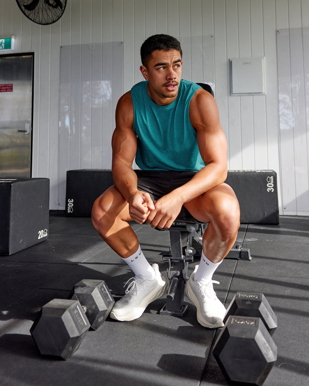 Man wearing AeroFLX+ Seamless Muscle Tank - Blue Bird Marl