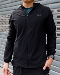 Man wearing Train-Lite FLXMAX Jacket - Black
