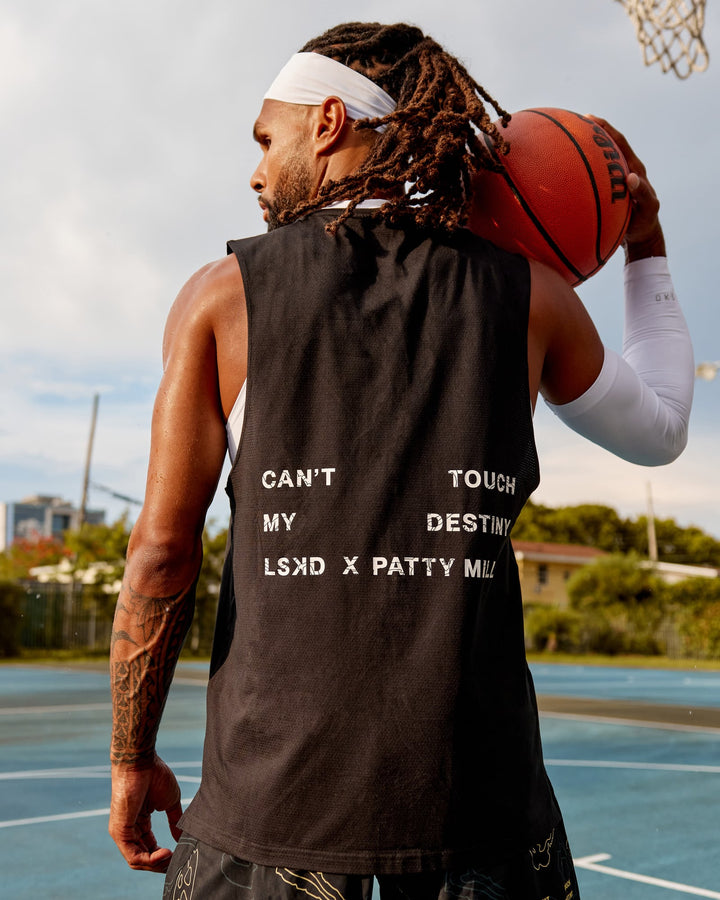 Man wearing Patty Mills Perform VapourFLX Muscle Tank - Black Reflective
