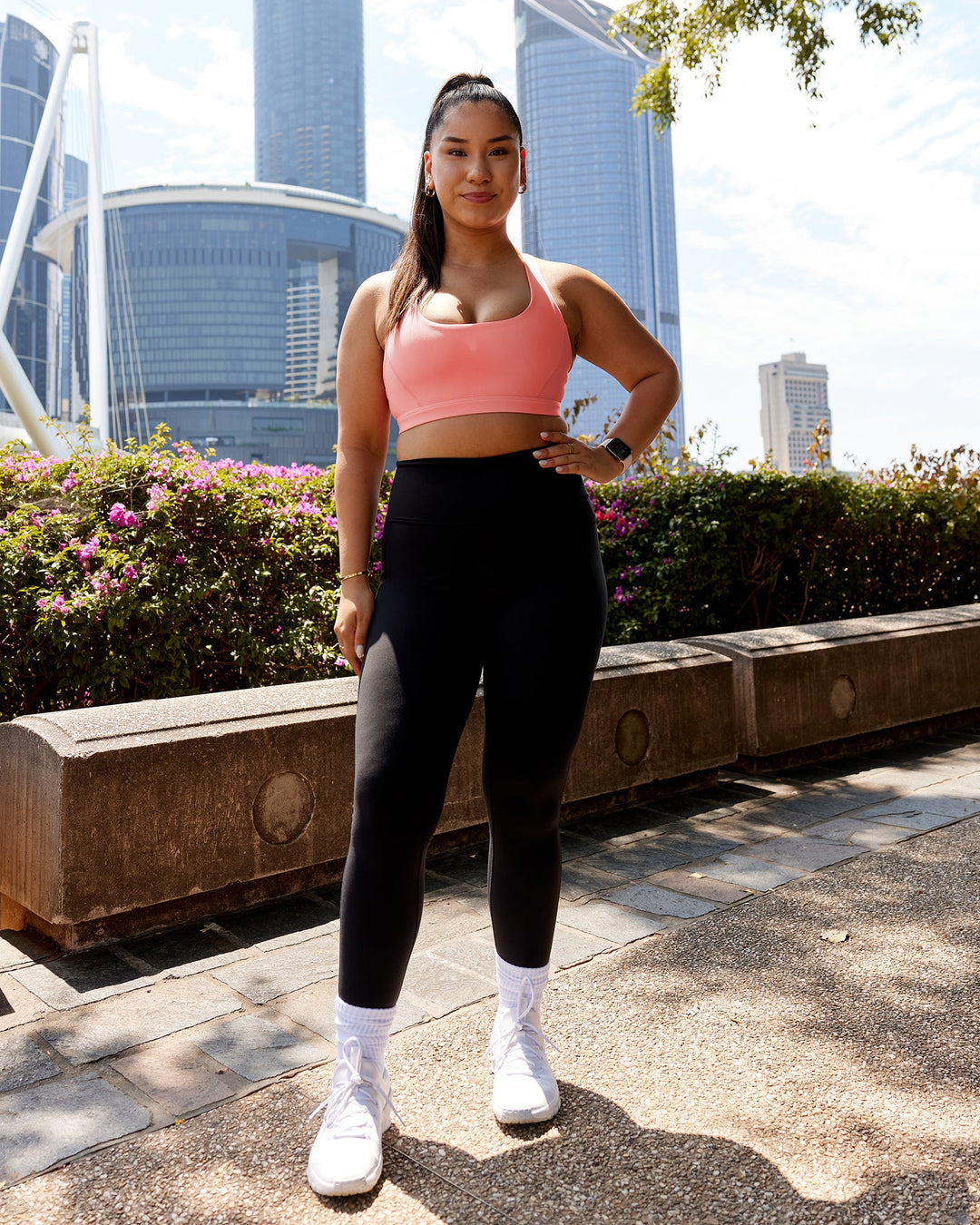 Woman wearing Precision Sports Bra - Murex Shell