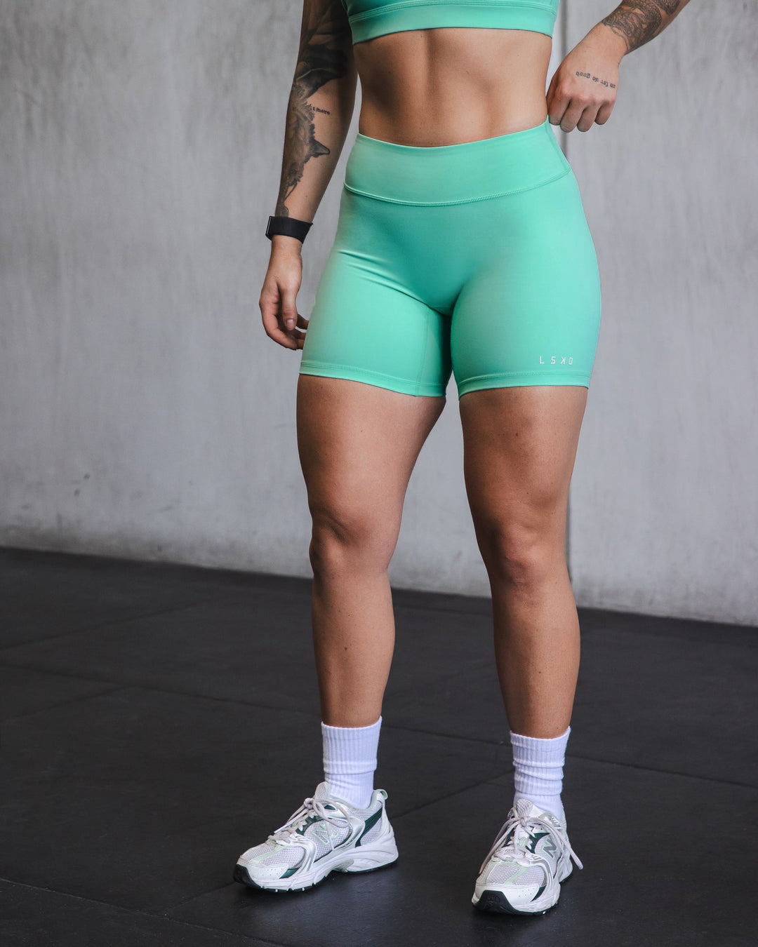 Woman wearing RXD Mid-Length Shorts - Cockatoo