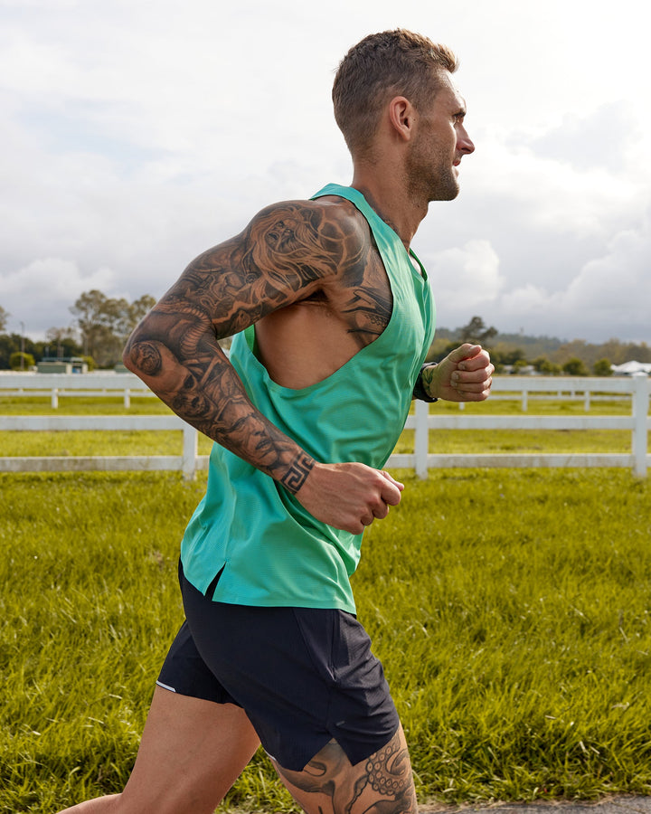 Man wearing Race Day Performance Tank - Mystic Green
