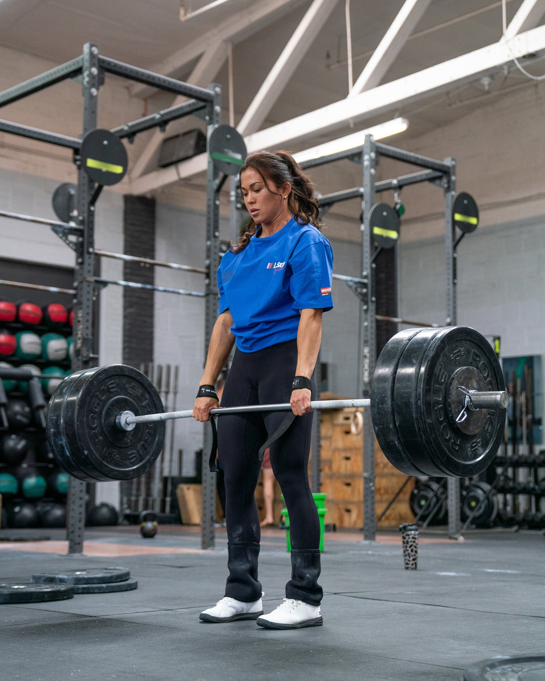 Woman wearing Unisex Redline FLXCotton Tee Oversize - Power Cobalt-White