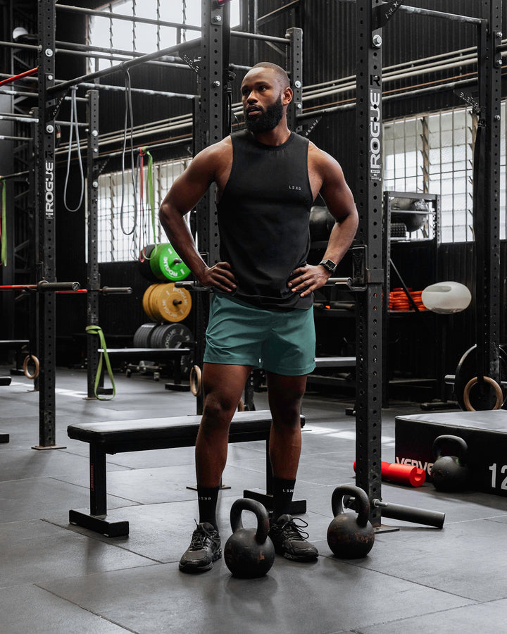 Man wearing Rep 5&quot; Performance Shorts - Sage Bush
