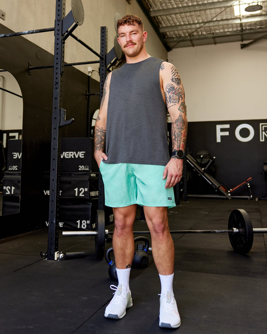 Man wearing Rep 7&quot; Performance Shorts - Digital Camo Cockatoo