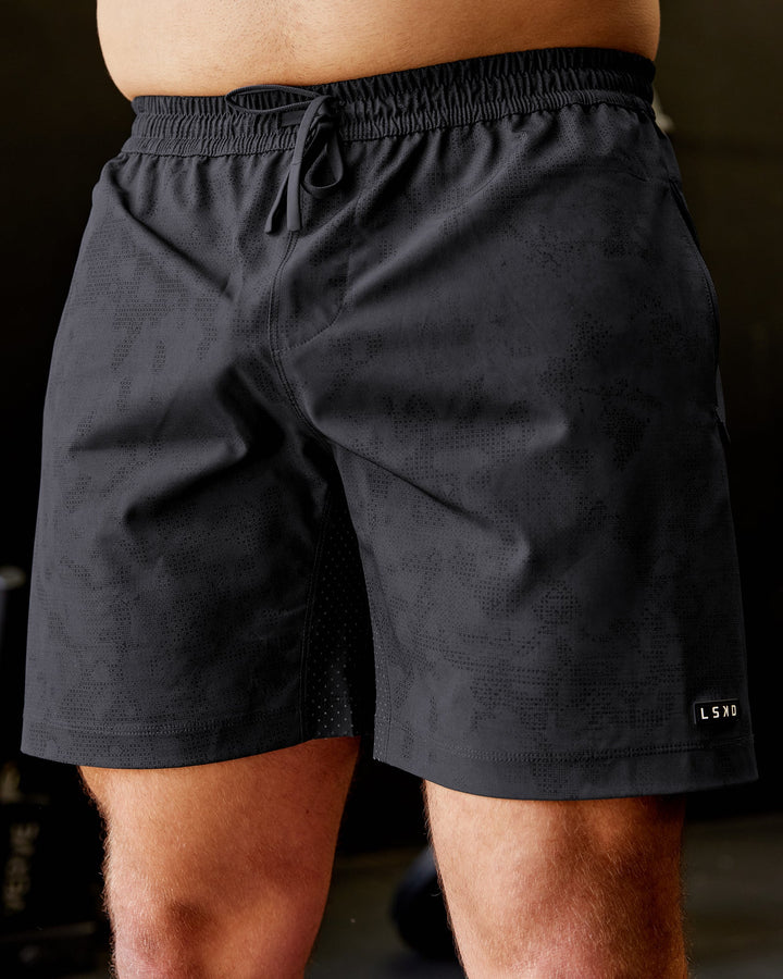 Man wearing Rep 7&quot; Performance Shorts - Digital Camo Pirate Black
