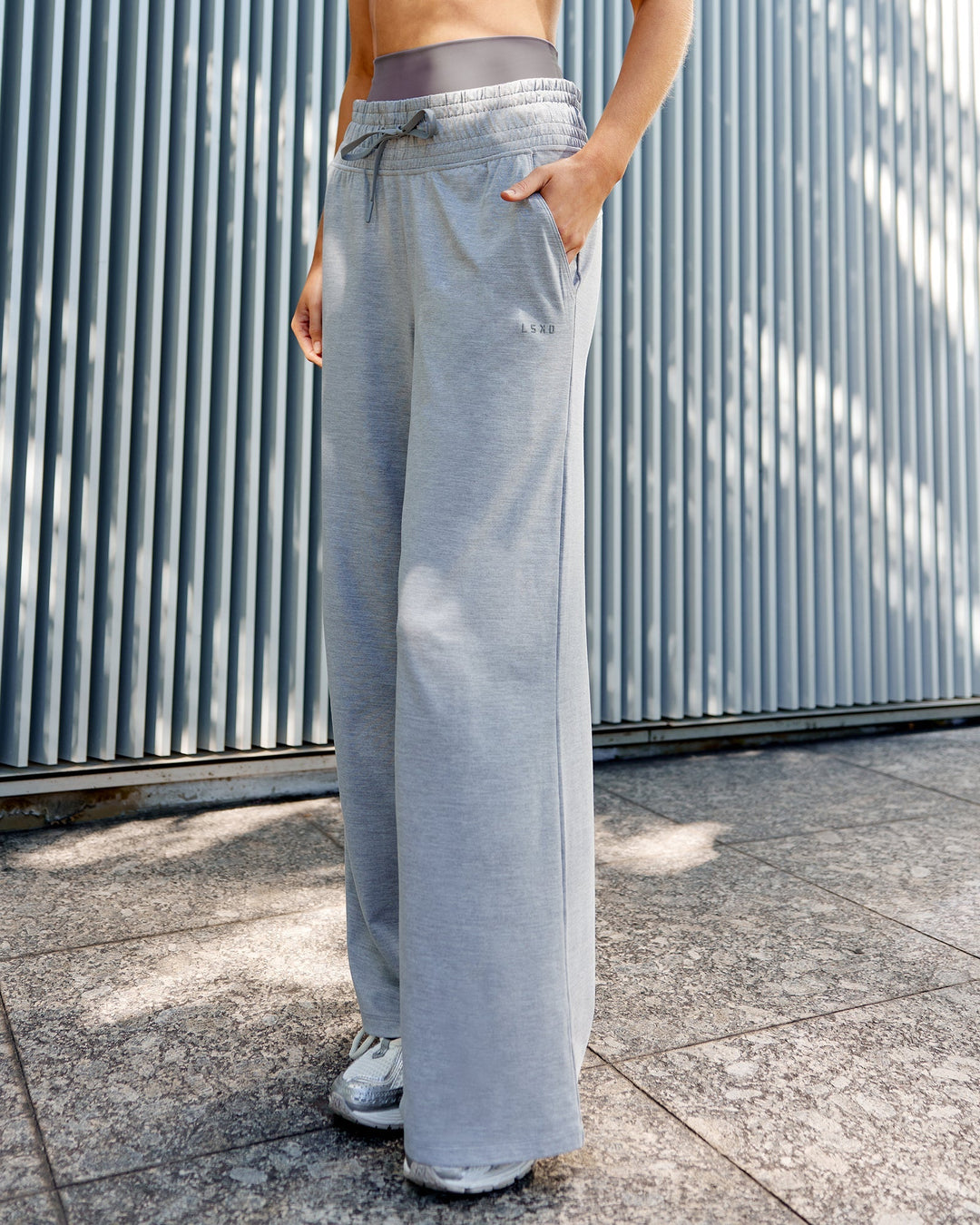 Woman wearing Restore CloudFLX Wide Leg Pants - Light Grey Marl