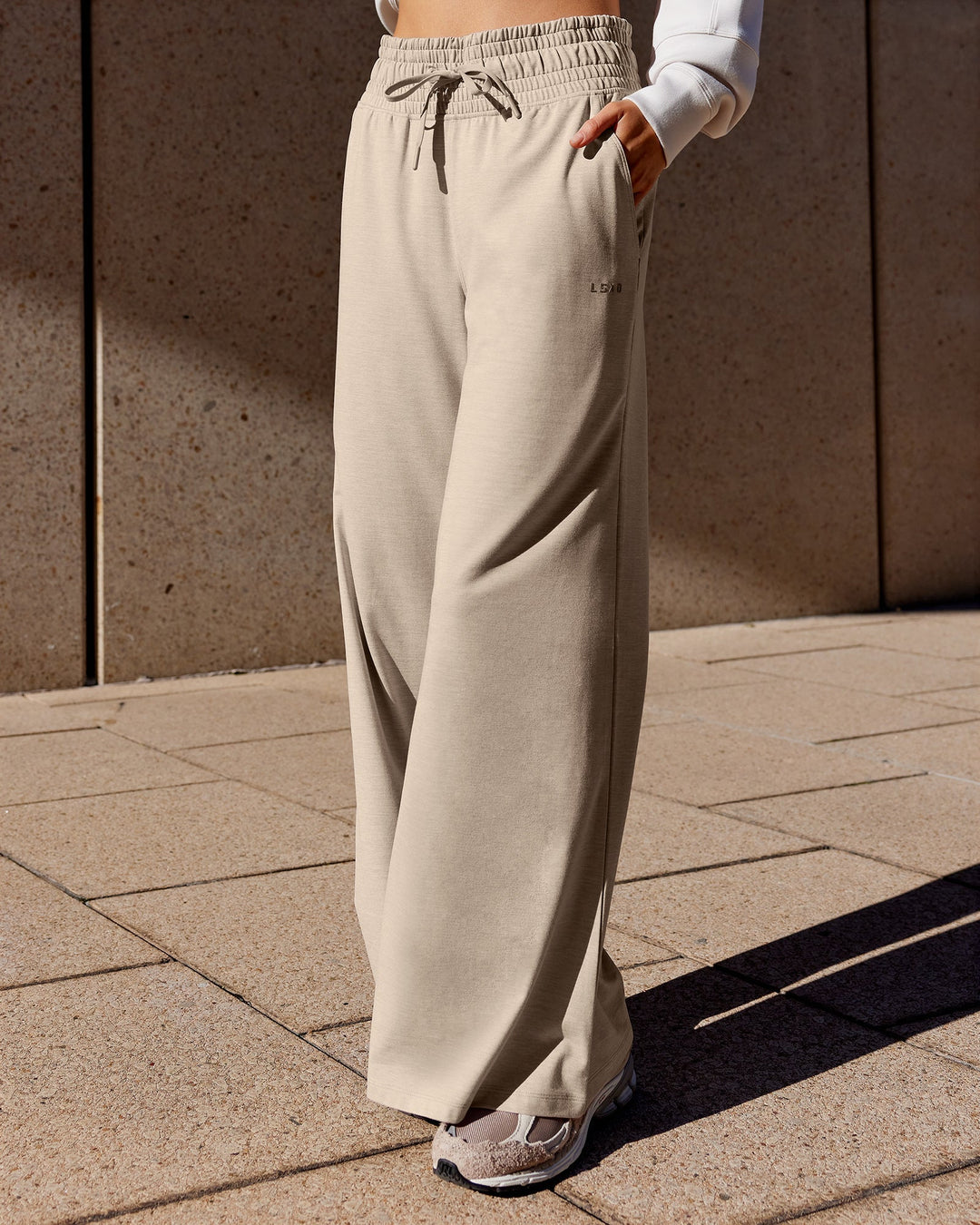 Woman wearing Restore CloudFLX Wide Leg Pants - Oatmeal Marl