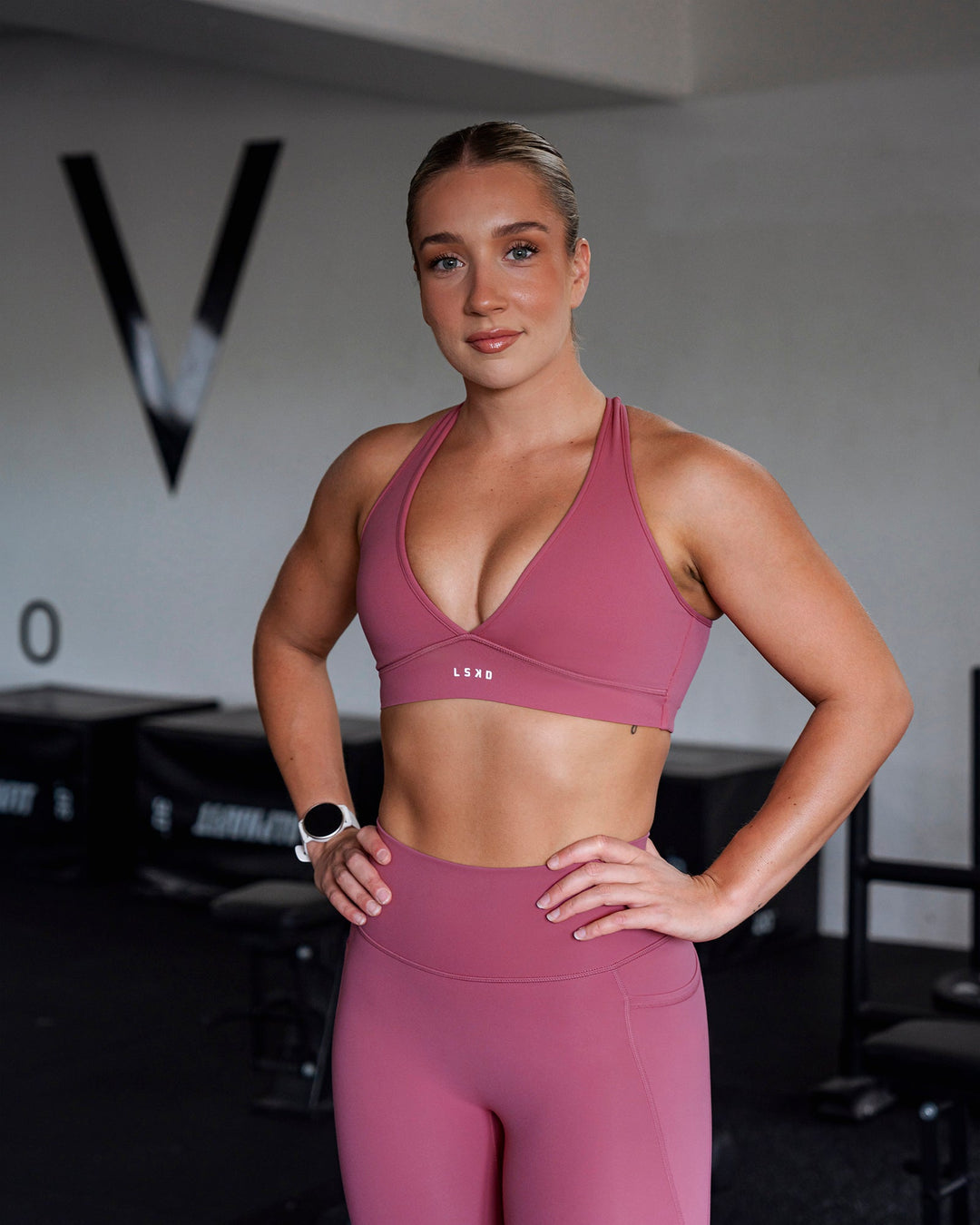 Woman wearing Stamina Sports Bra - Mauve Haze