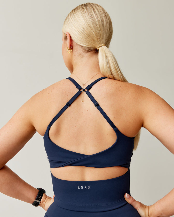 Woman wearing Twist Shelf Bra Tank - Future Navy
