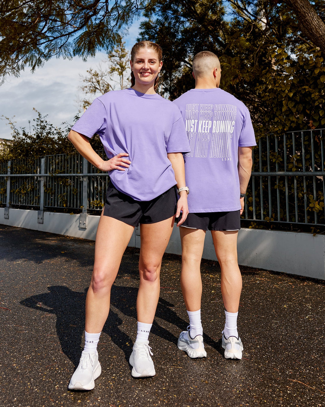 Duo wearing Unisex Keep On Running FLXCotton Tee Oversize - Dahlia Purple