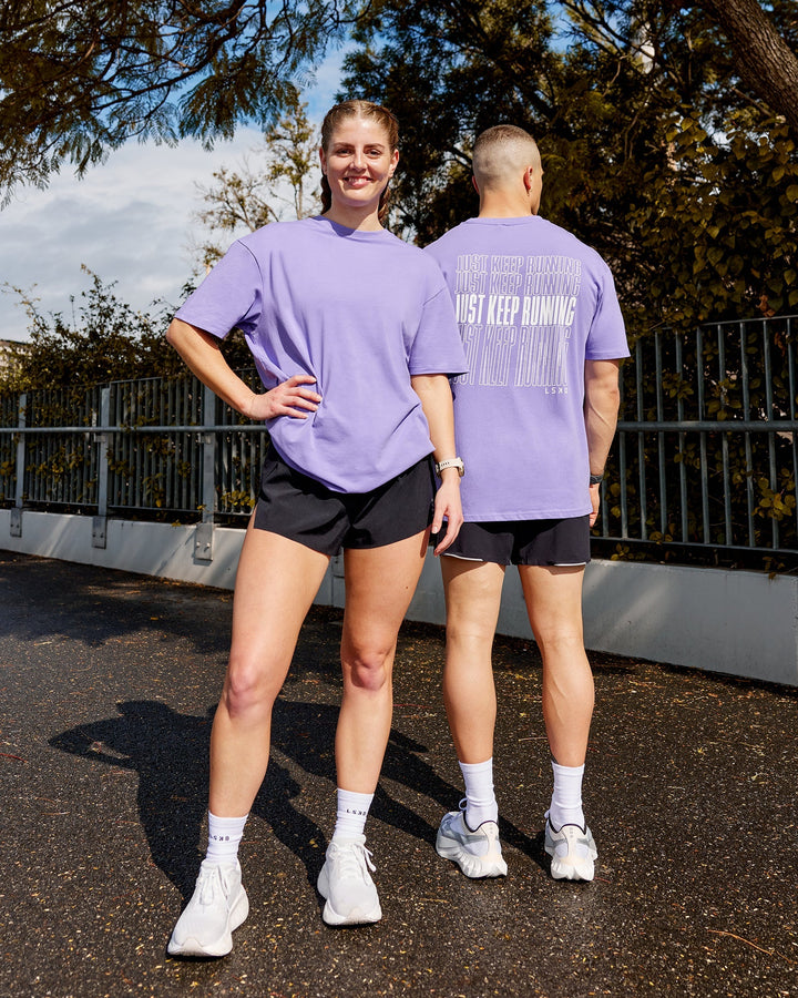 Duo wearing Unisex Keep On Running FLXCotton Tee Oversize - Dahlia Purple
