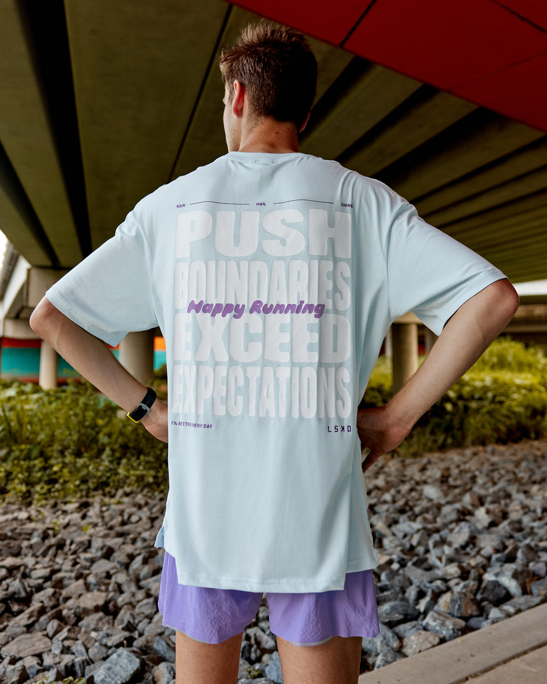 Man wearing Unisex Push Boundaries FLXCotton Tee Oversize - Light Cyan-White