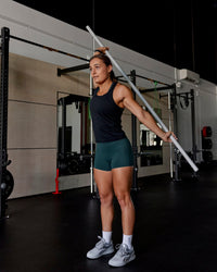 Woman wearing AeroFLX+ Seamless Tank - Black Marl