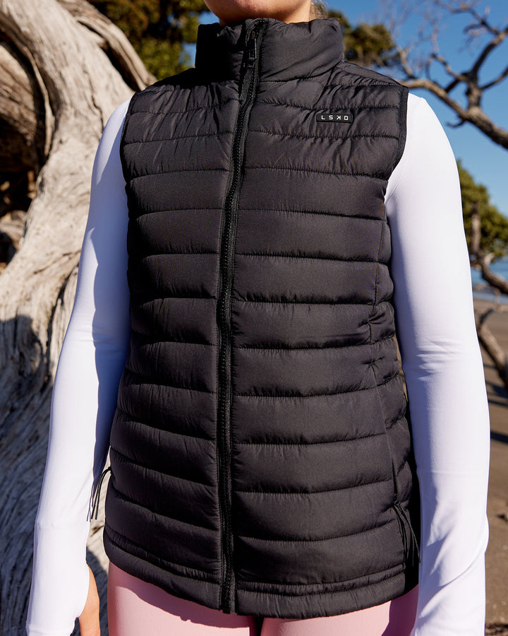 Woman wearing All Day Puffer Vest - Black