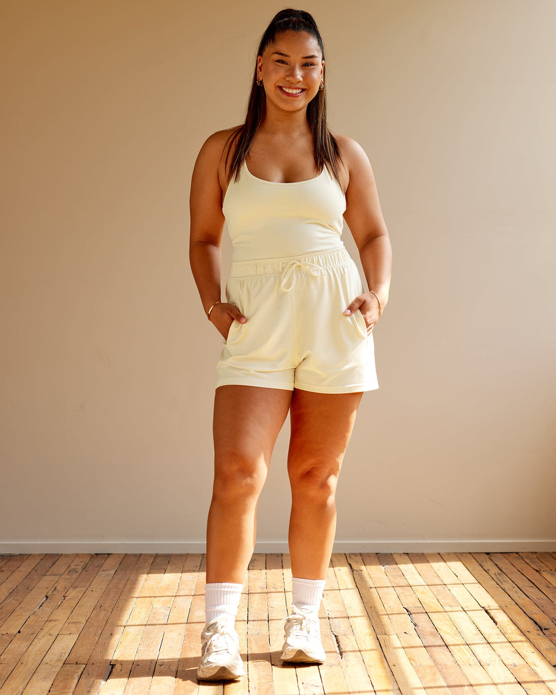 Woman wearing Restore CloudFLX Shorts - Ivory