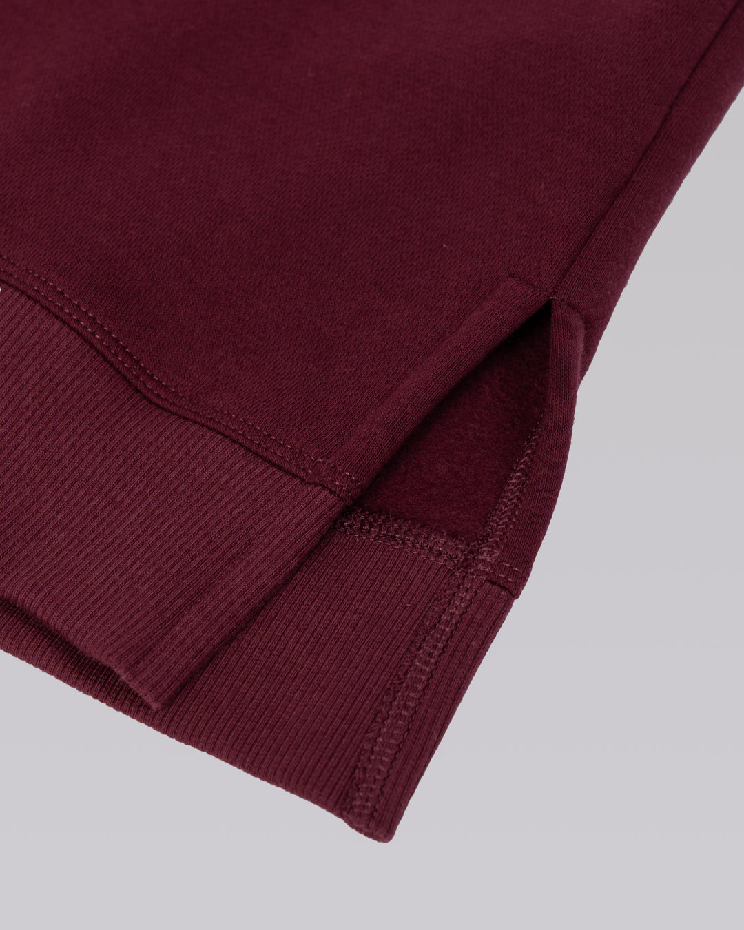 Full Form Fleece Sweater with Side Slits - Cherry Lacquer