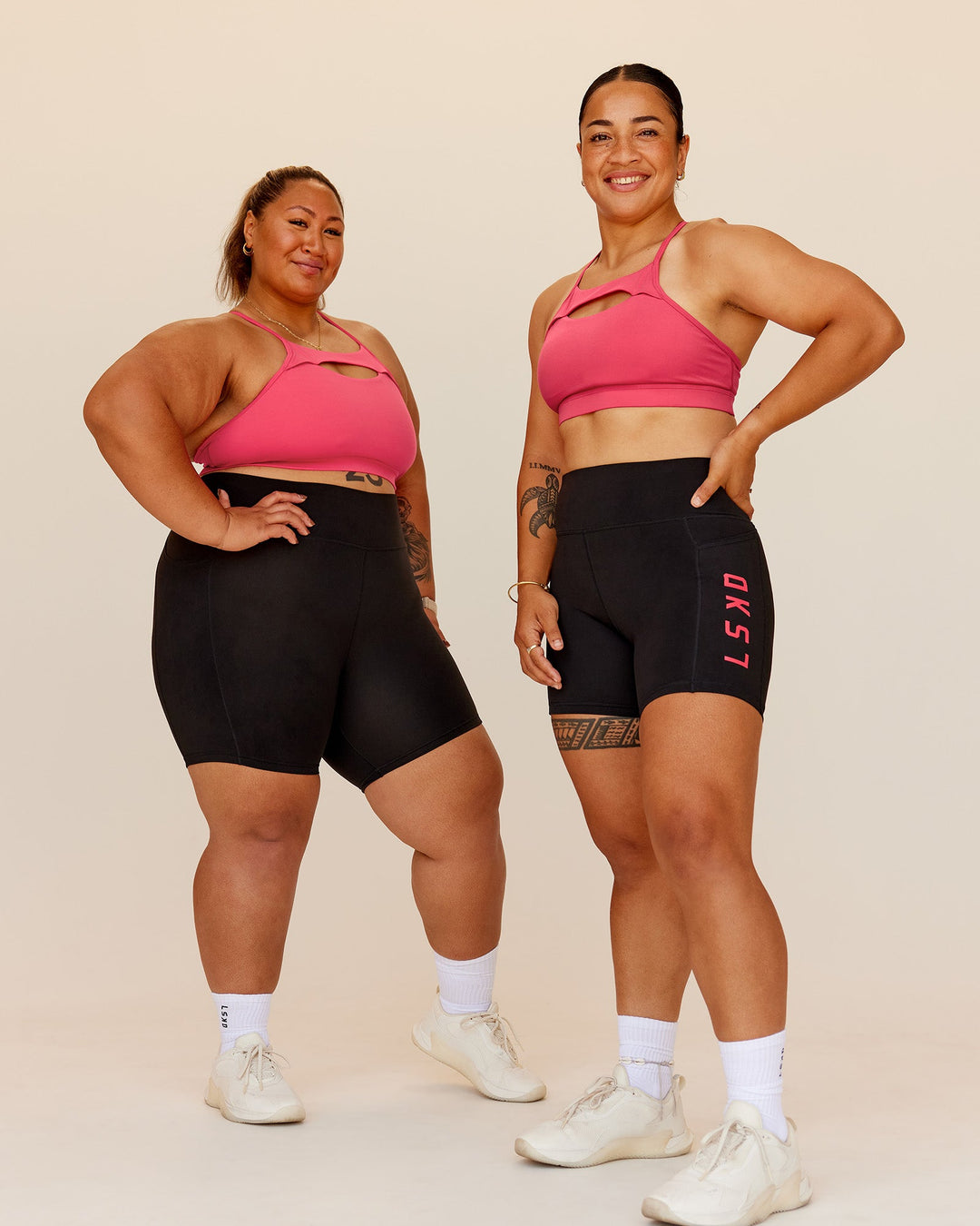 Woman wearing Be Bold Sports Bra - Bright Raspberry | Model:Both | Size:Duo