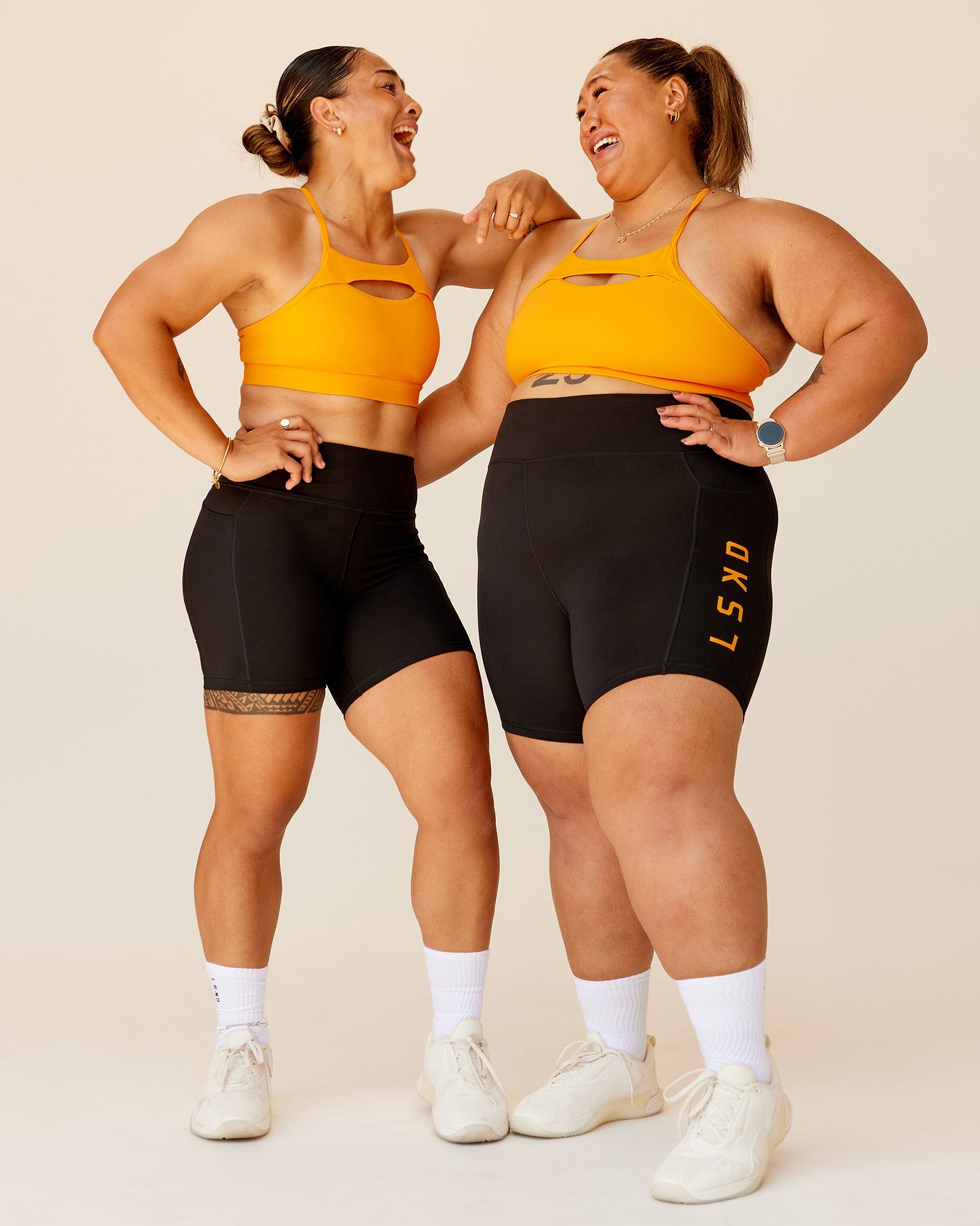 Woman wearing Be Bold Sports Bra - Zinnia | Model:Both | Size:Duo