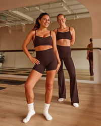 Duo wearing Peaches Wrap Sports Bra - Hot Chocolate | Model:Both | Size:Duo | Thumbnail Index: 0