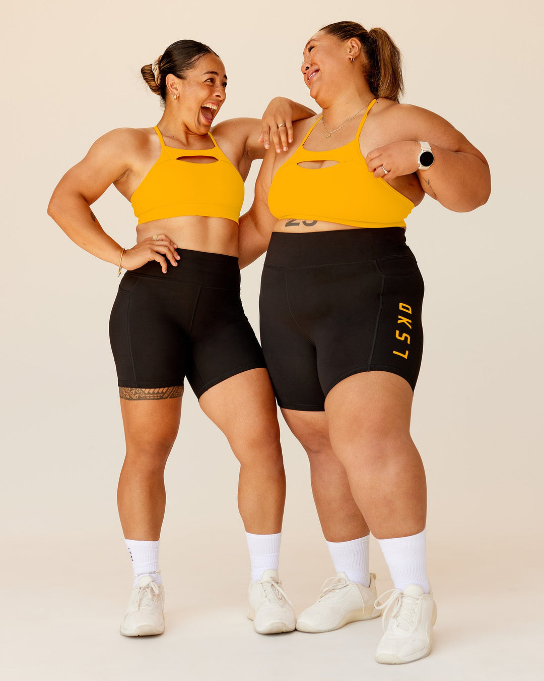 Woman wearing Rep Ultra High-Rise 6&quot; Short Pockets - Black-Zinnia | Model:Duo | Size:Both