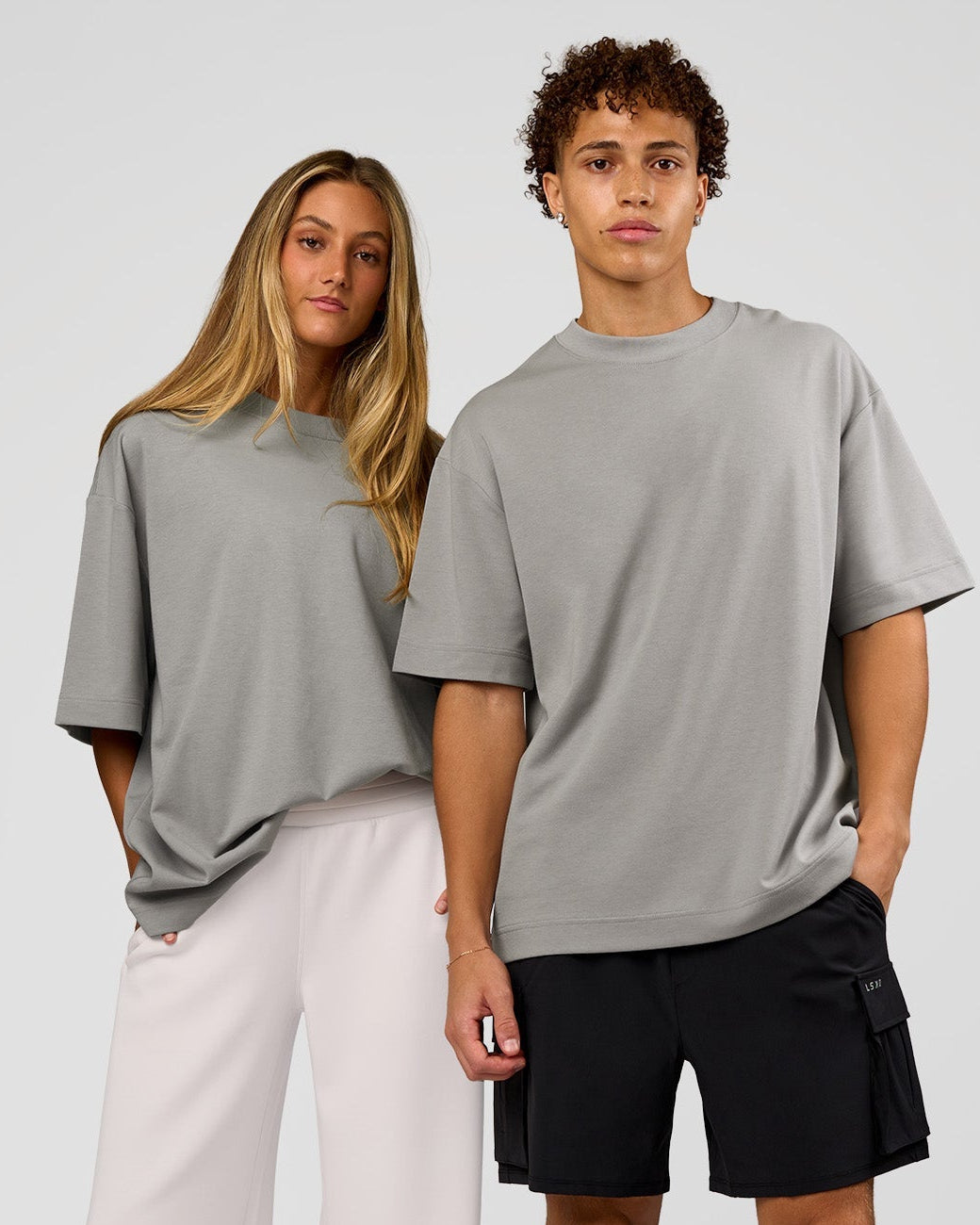Duo wearing AfterDark ZeroCrease Oversized Tee - Alloy | Model:Both | Size:Duo