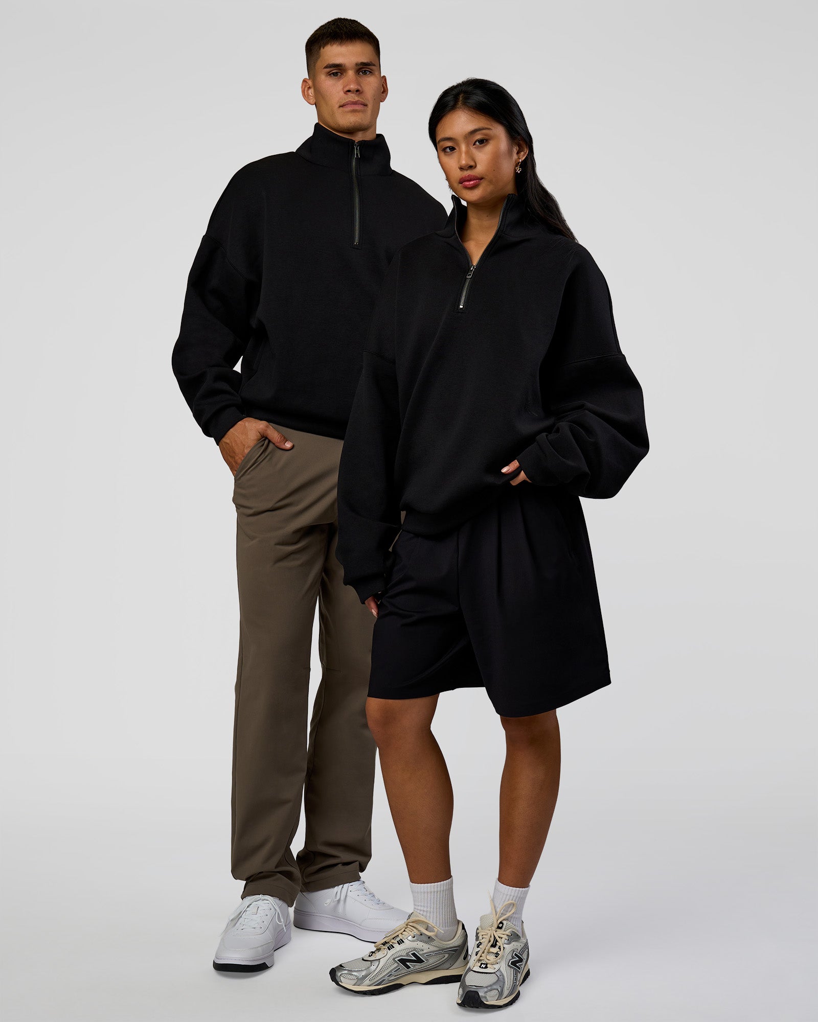 Duo wearing AfterDark ZeroCrease Quarter Zip - Black | Model:Both | Size:Duo