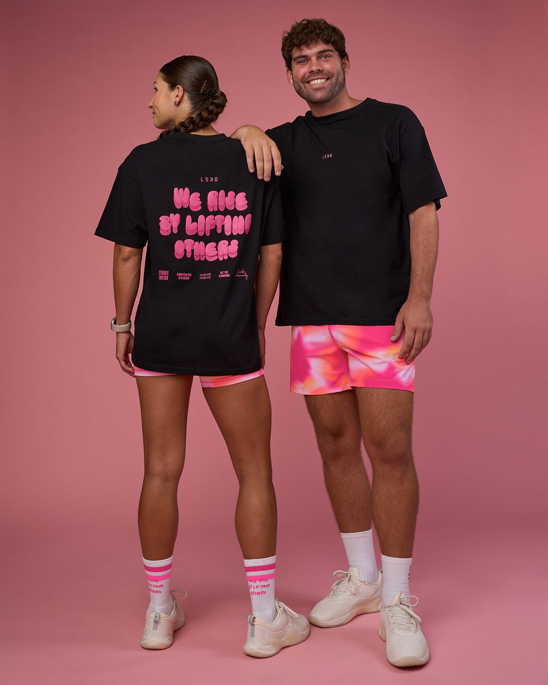 Woman wearing BCAM FLXCotton Oversized Tee - Black-Ultra Pink | Model:Duo | Size:Both