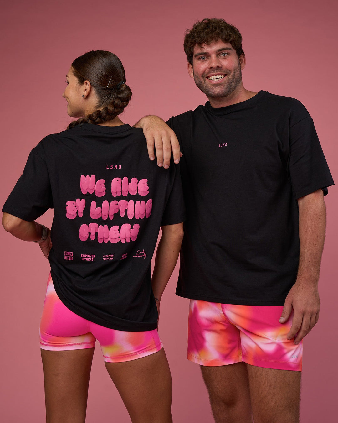 Woman wearing BCAM FLXCotton Oversized Tee - Black-Ultra Pink | Model:Duo | Size:Both