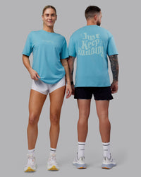 Duo wearing Just Run FLXCotton Oversized Tee - Retro Blue-Light Retro Blue | Model:Both | Size:Duo