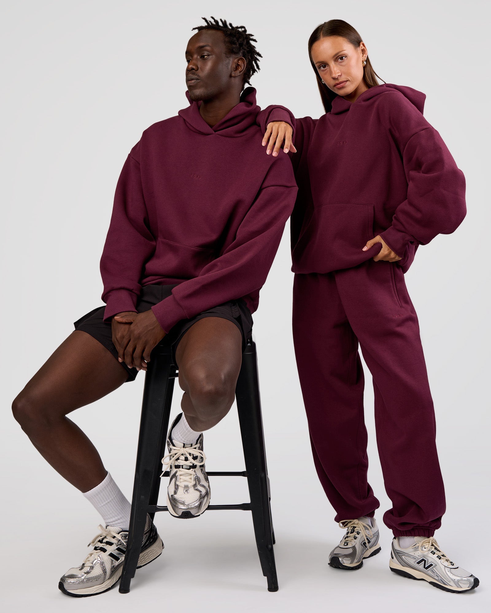 Duo wearing MVP Oversized Hoodie - Cherry Lacquer | Model:Both | Size:Duo