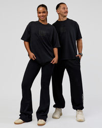 Duo wearing Move Fast Heavyweight Oversized Tee - Black Washed | Model:Both | Size:Duo
