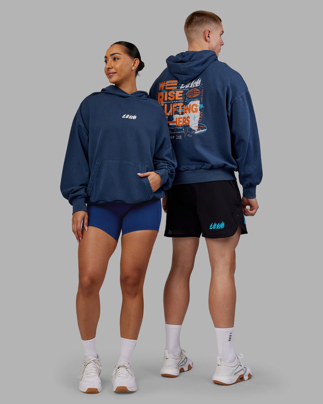 Duo wearing NY25 Washed Oversized Hoodie - Future Navy-Ultra Orange | Model:Both | Size:Duo