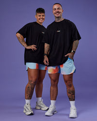 Duo wearing Our Journey Heavyweight Oversized Tee - Black-Rainbow | Model:Both | Size:Duo