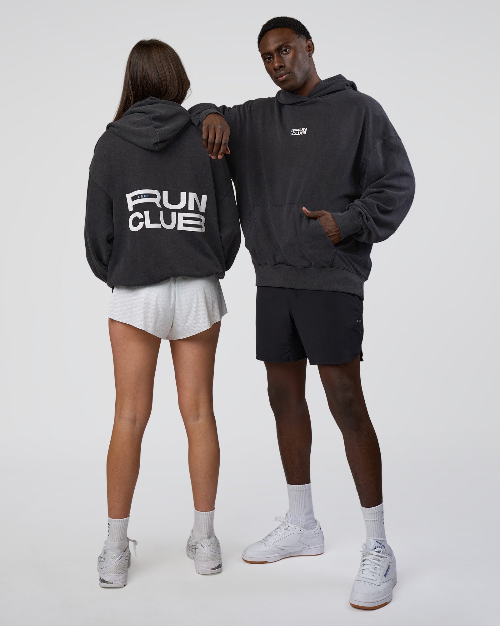 Duo wearing Runner’s Unisex Oversized Hoodie - Black Washed-White | Model:Both | Size:Duo