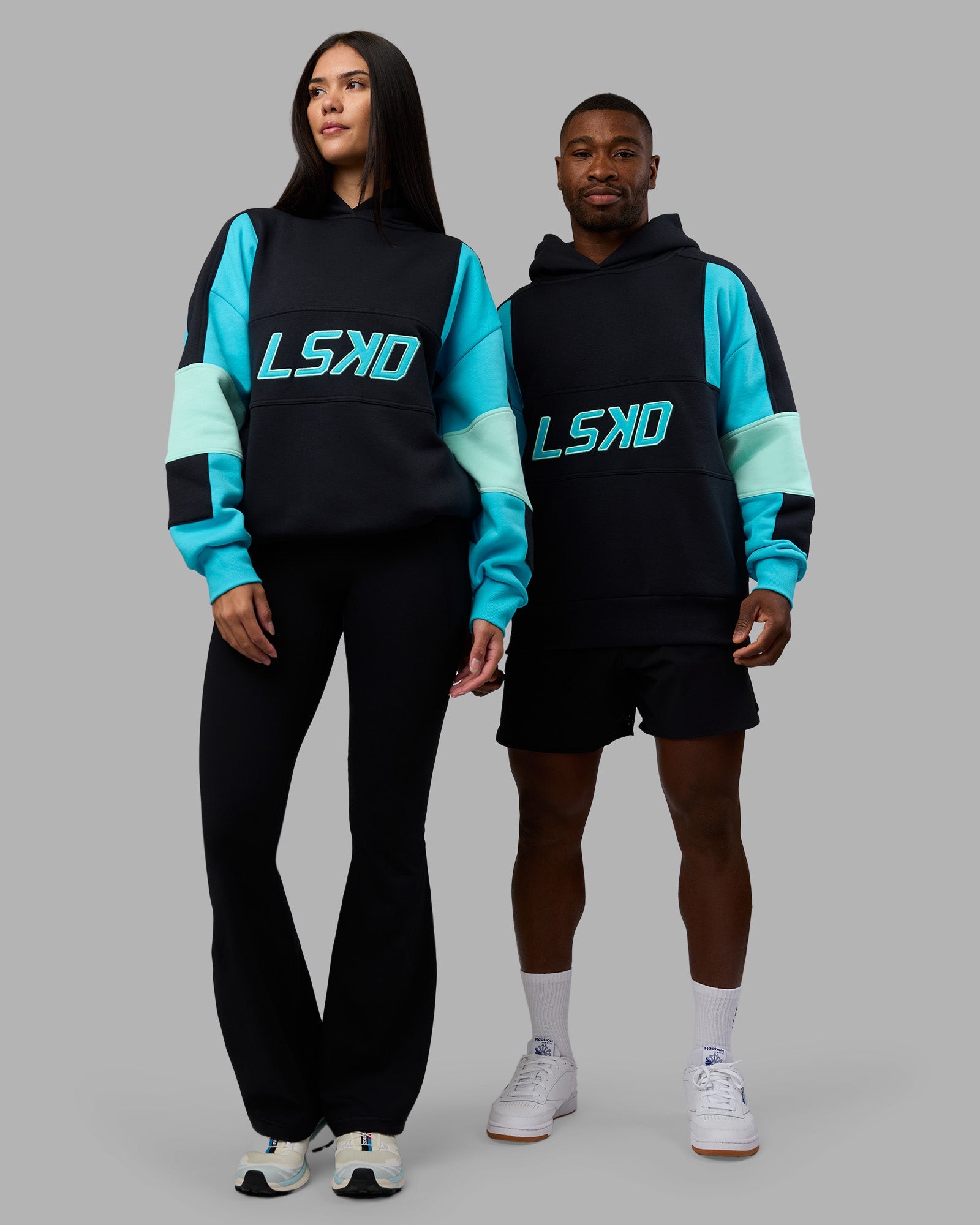 Duo wearing Slam Oversized Hoodie - Caviar-Blue Atoll | Model:Both | Size:Duo