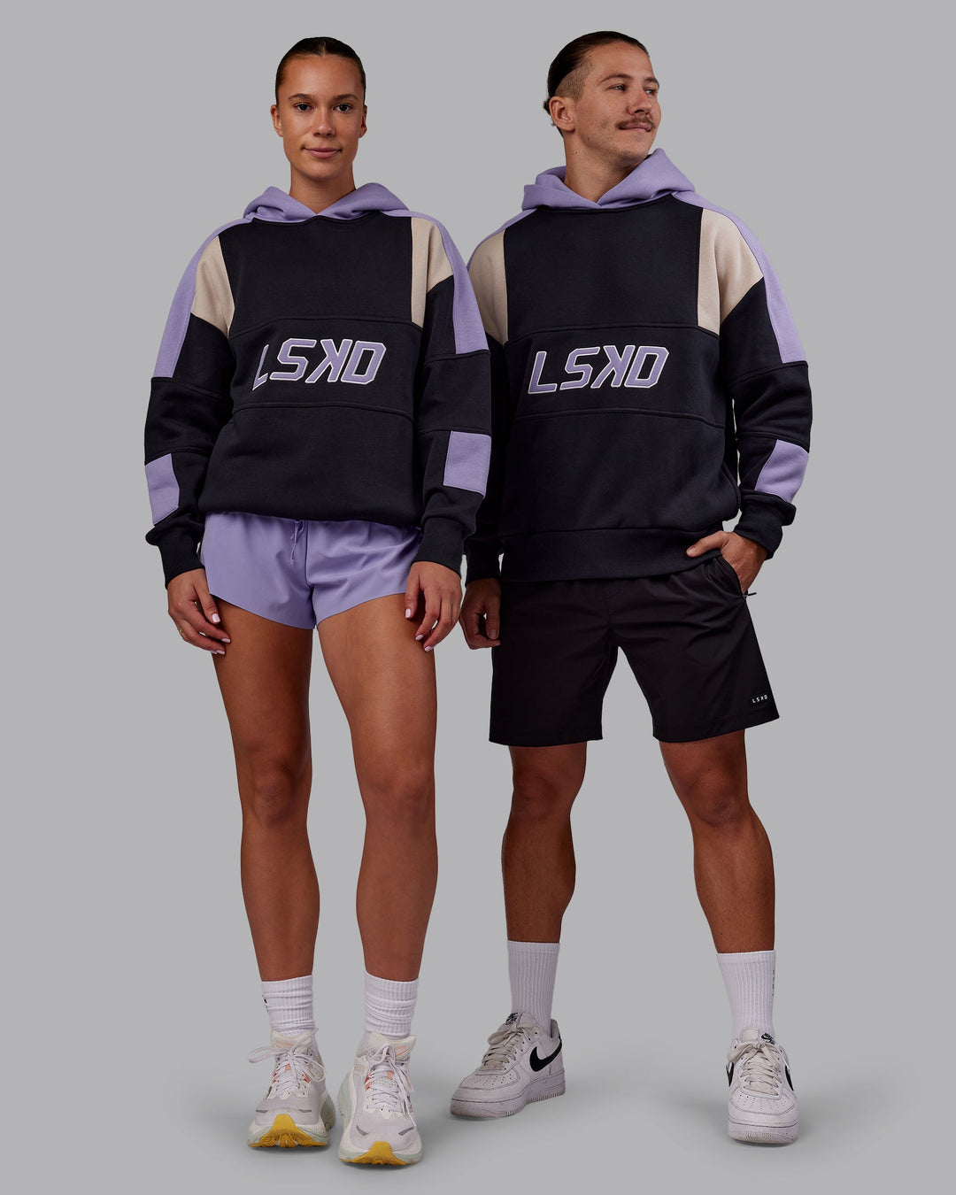 Duo wearing Slam Oversized Hoodie - Caviar-Violet Ray | Model:Both | Size:Duo