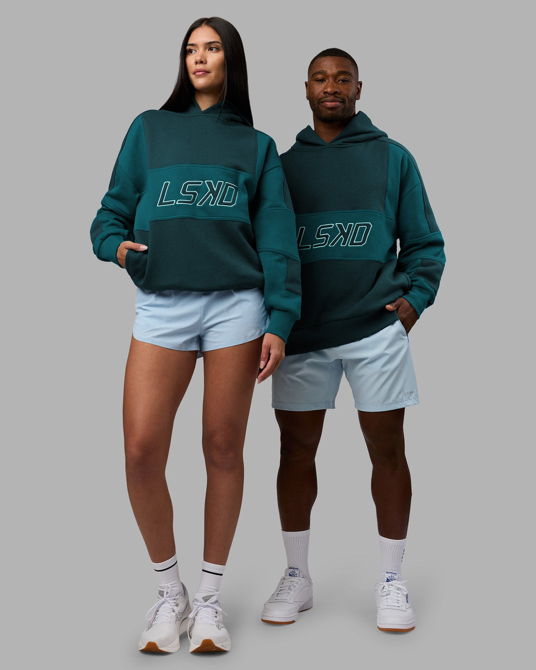Duo wearing Slam Oversized Hoodie - Deep Sea-Blue Coral | Model:Both | Size:Duo