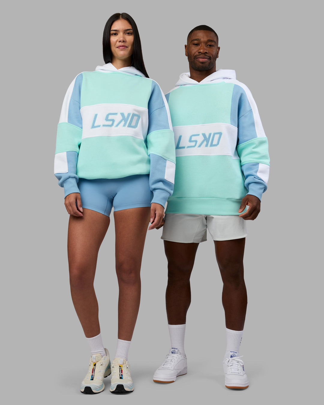 Duo wearing Slam Oversized Hoodie - Glacier Lake-Water Spout | Model:Both | Size:Duo