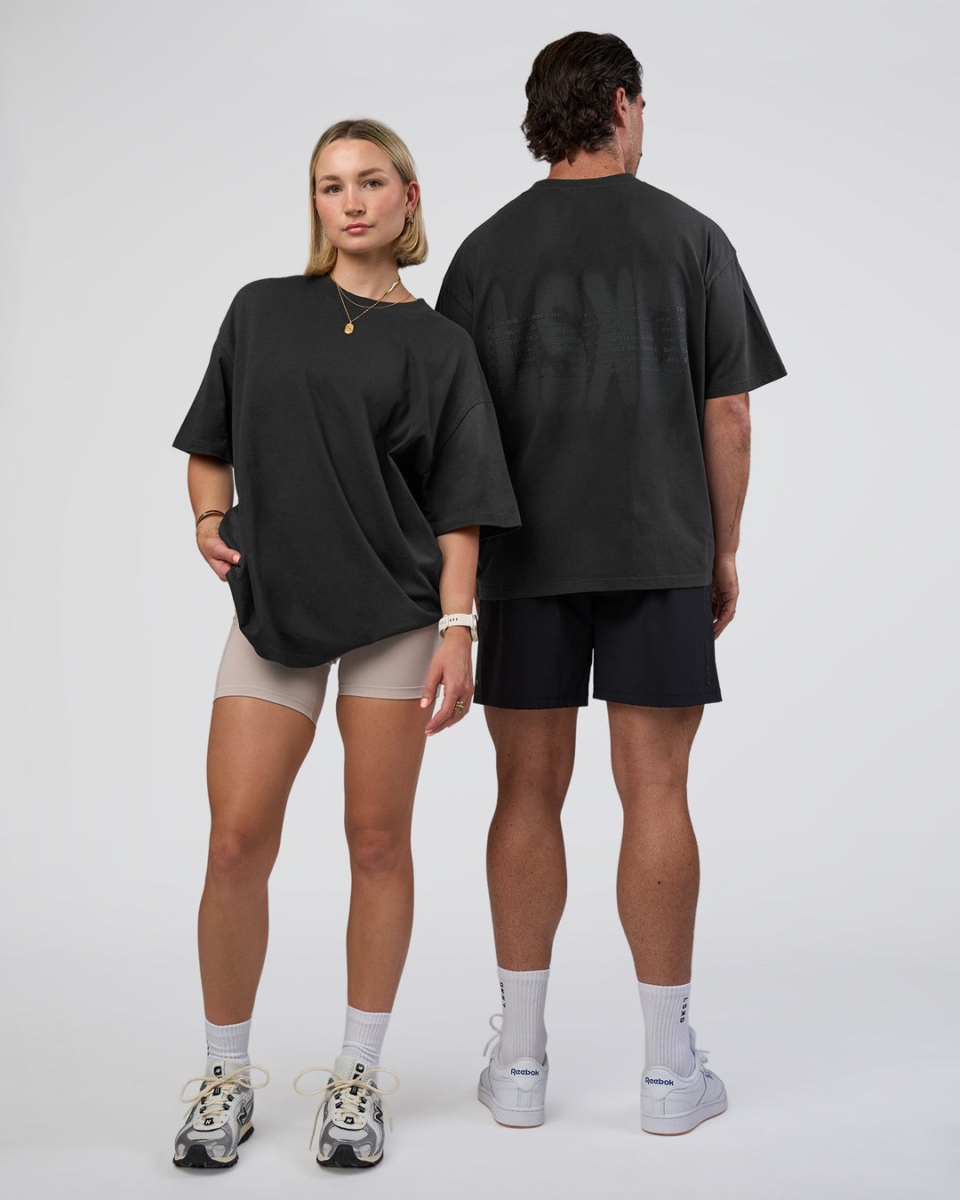 Duo wearing Spray Heavyweight Unisex Oversized Tee - Charcoal Washed | Model:Both | Size:Duo