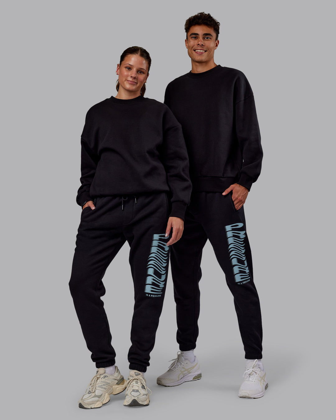 Duo wearing Static Track Pant - Black-Skyride | Model:Both | Size:Duo