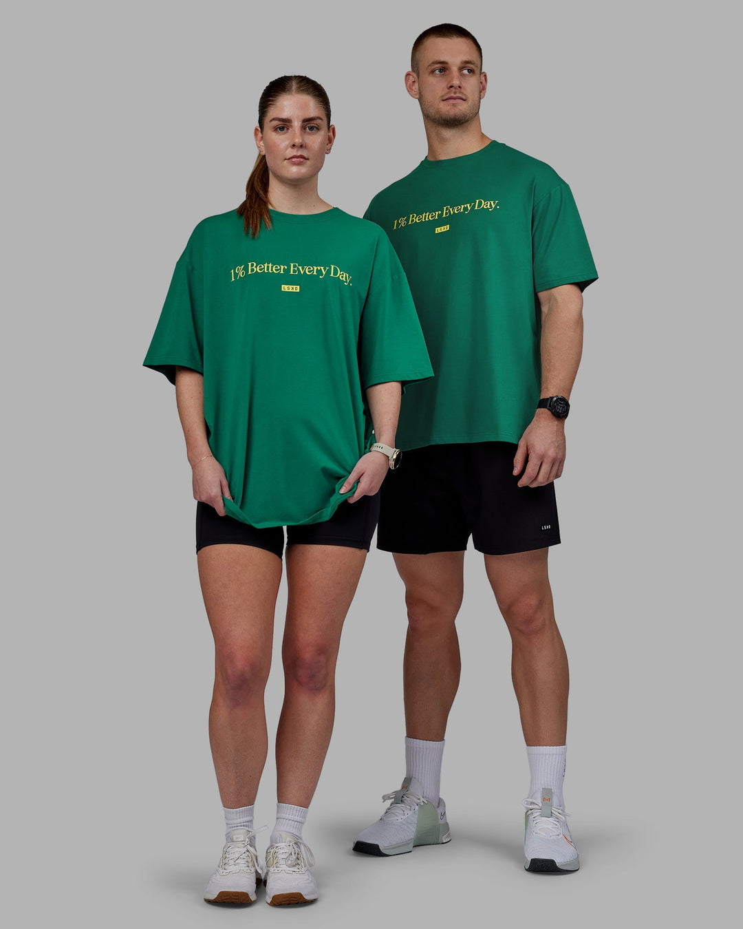 Duo wearing Unisex 1% Better FLXCotton Tee Oversize - Green-Gold