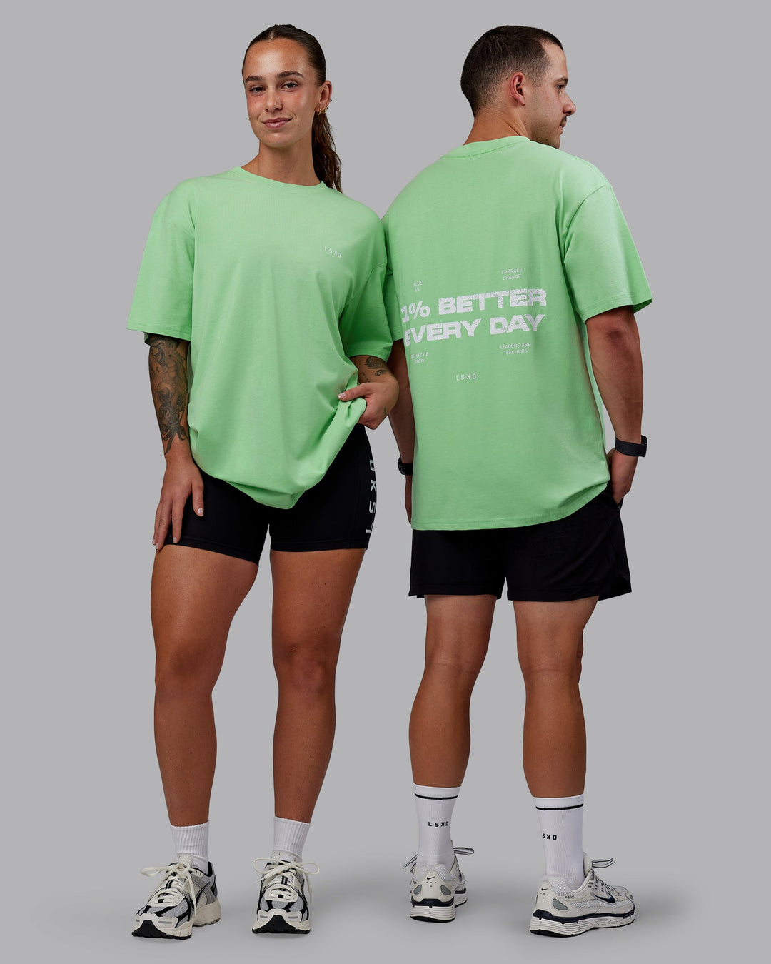 Duo wearing Unisex 1% Better Value Series FLXCotton Tee Oversize - Surreal Green-White