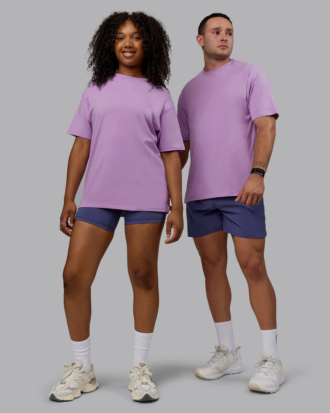 Duo wearing Unisex Deluxe PimaFLX Tee Oversize - Light Violet