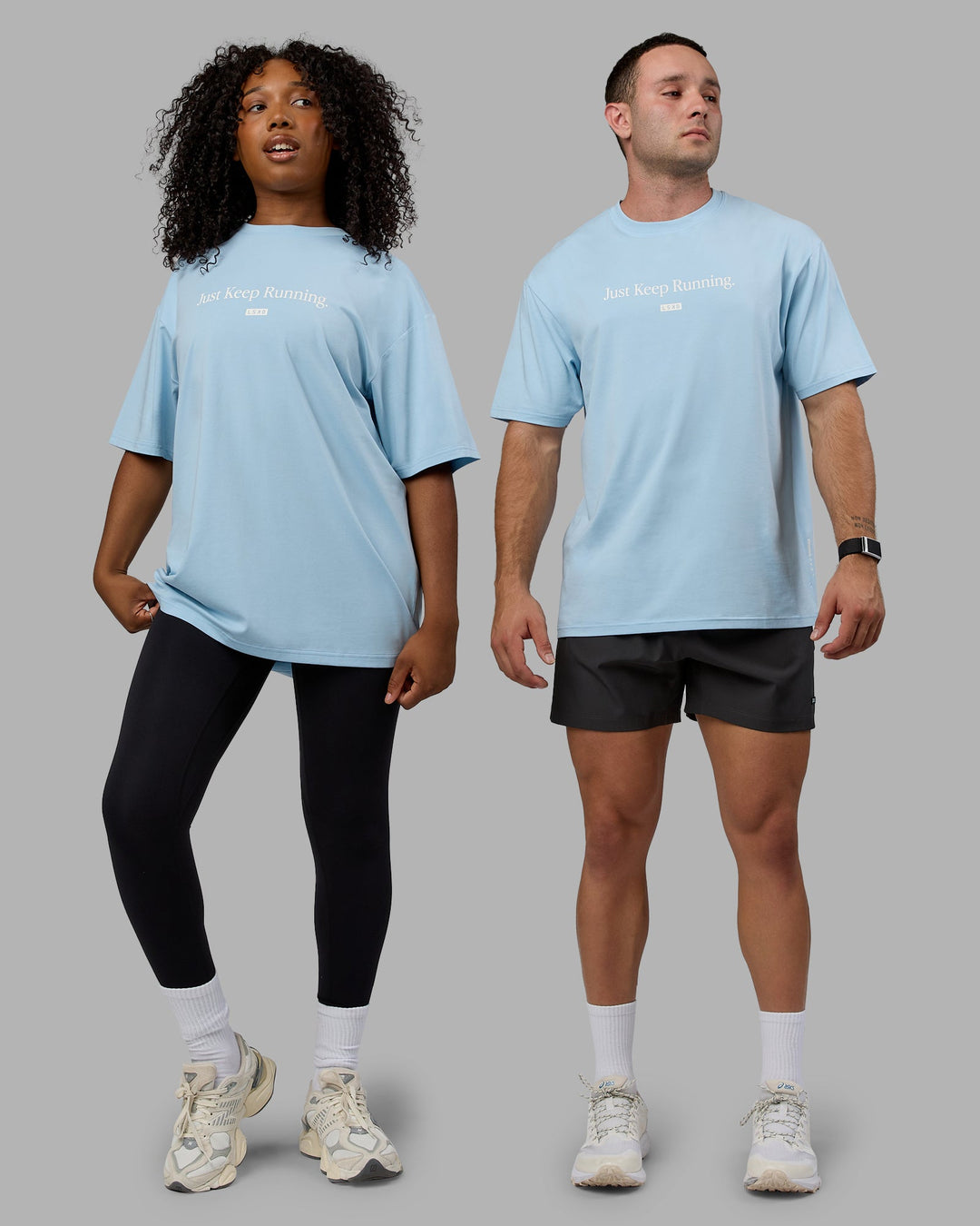 Duo wearing Unisex Just Keep Running FLXCotton Tee Oversize - Glacial Blue-Off White